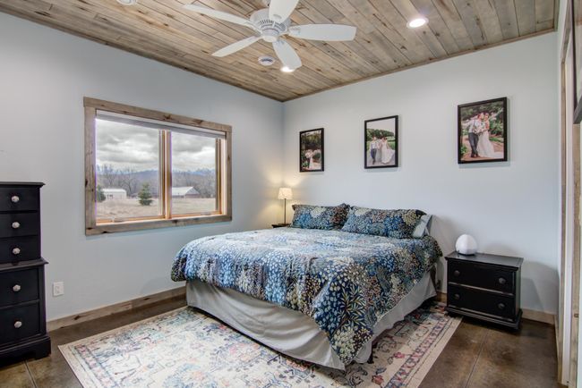 Primary bedroom with spacious walk in closet | Image 15