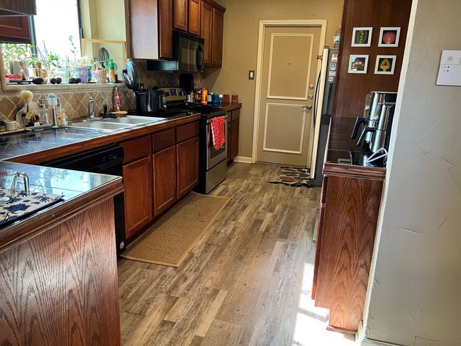New flooring in the kitchen. | Image 6