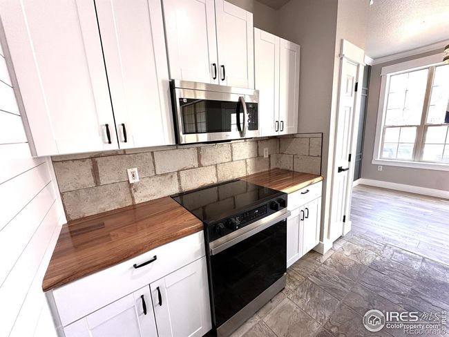 Plenty of cabinet storage and a pantry for addl space! | Image 17