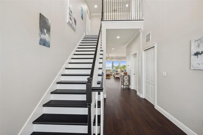 View from entryway/foyer, with stairs leading up to the 3rd floor. (elevator also available) | Image 76