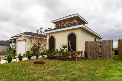 View of front of house with a front yard | Image 1