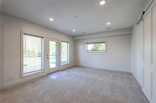 Walk out to small private patio abundance of light | Image 56