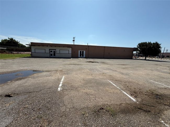 View of uncovered parking lot | Image 5