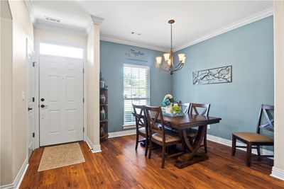 Entryway and open dining area. | Image 2