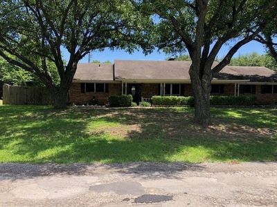 Single story home with a front yard | Image 1