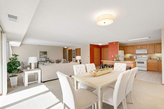 Dining area with kitchen view | Image 6