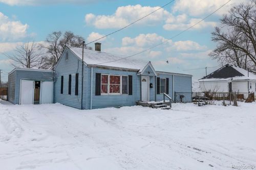 1108 Wisner St, Saginaw, MI, 48601-3846 | Card Image