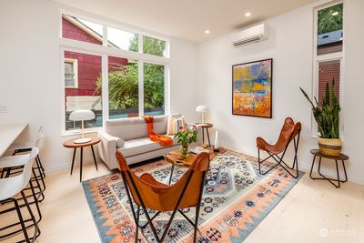 Spacious living room with tall ceilings. | Image 3