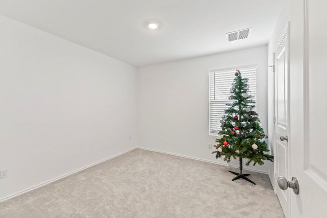 Empty room featuring carpet and baseboards | Image 21