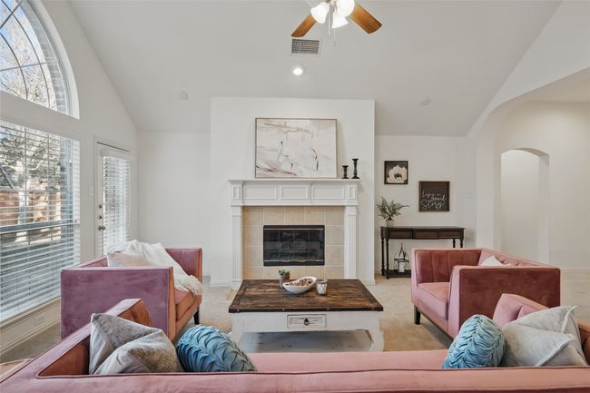 Large Windows bring in lots of natural light to the Family Room | Image 11