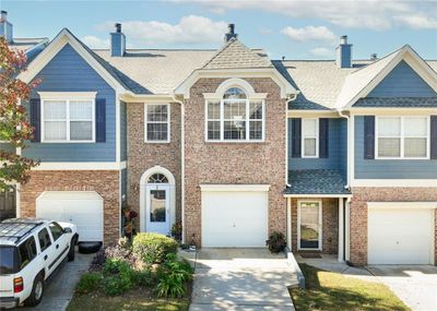 6483 Portside Way, Townhouse with 3 bedrooms, 2 bathrooms and null parking in Flowery Branch GA | Image 1