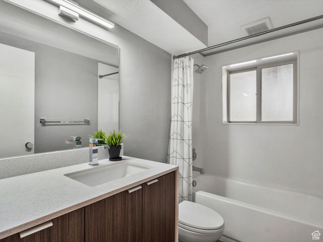 Full bath with vanity and shower / bathtub combination with curtain | Image 33