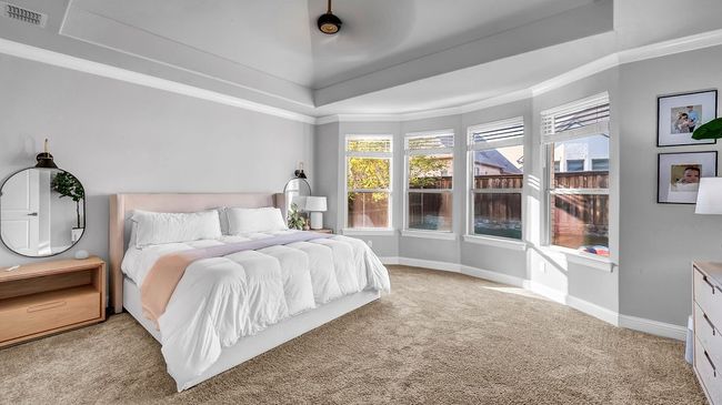 Primary Bedroom with bay windows | Image 10