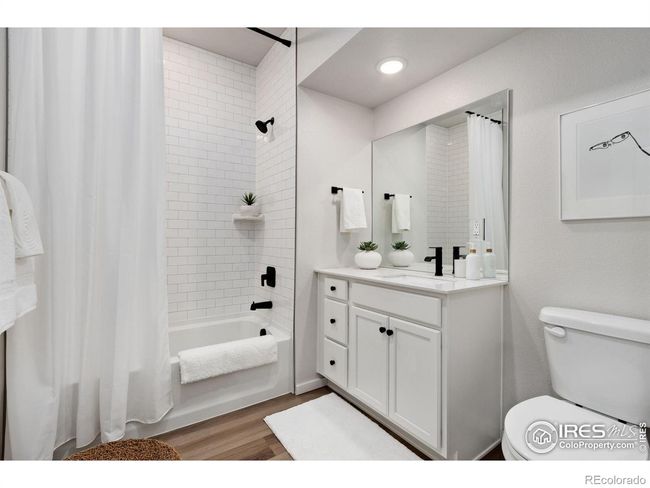 Full bath with stylish subway tile, quartz countertop, and upgraded hardware & fixtures. | Image 17