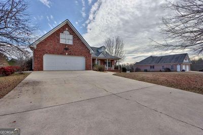 7985 Bethel Road, House other with 4 bedrooms, 3 bathrooms and 10 parking in Gainesville GA | Image 2