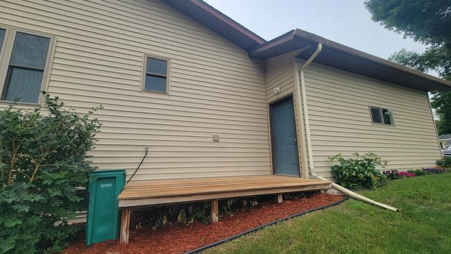 Newer deck off back garage entry door | Image 23