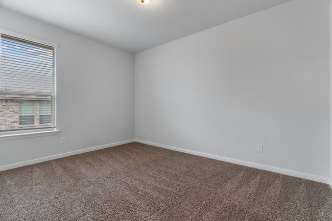 Carpeted spare room with baseboards | Image 22