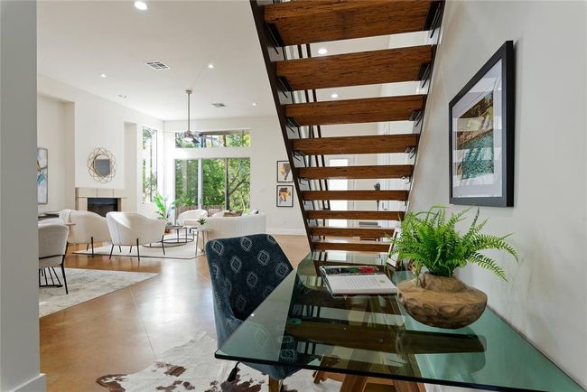 Dining area with recessed lighting and a fireplace | Image 8