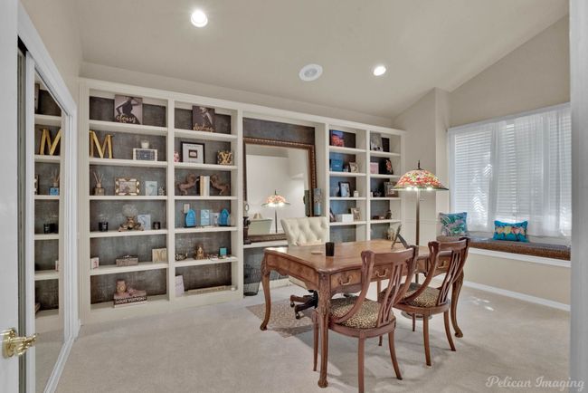 Office with vaulted ceiling, carpet flooring, baseboards, and recessed lighting | Image 16
