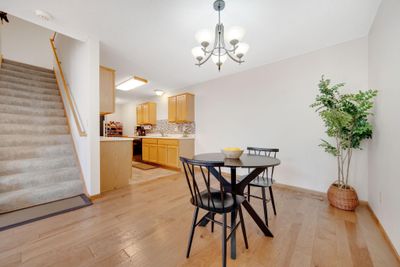 Living room flowing into the dining room. | Image 2