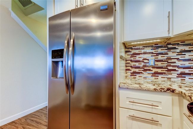 Kitchen with Stone Countertops, Stainless Steel Applicances | Image 22