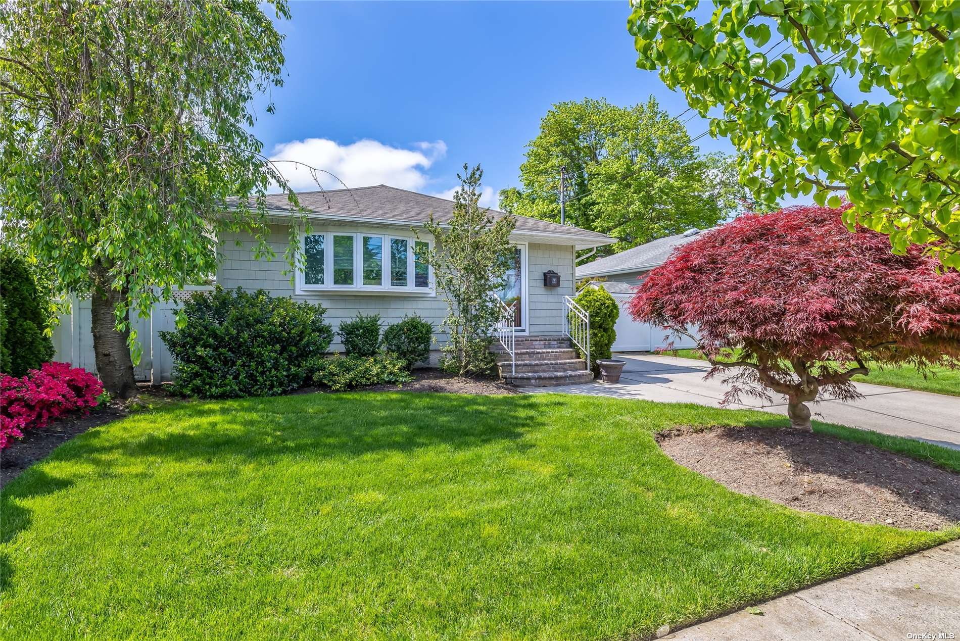 Maple St, Massapequa, NY 11758