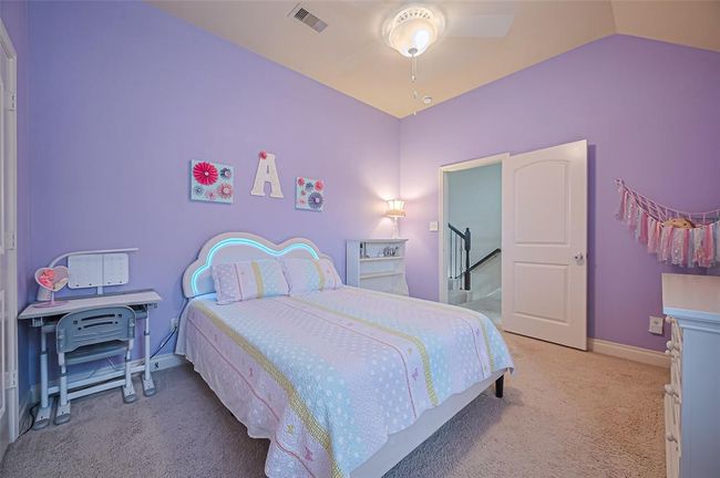 Upstairs, you’ll find three additionalbedrooms. Each bedroom is thoughtfullyappointed with plush carpeting, aspacious closet, and picture windowsthat fill the rooms with natural light. | Image 31