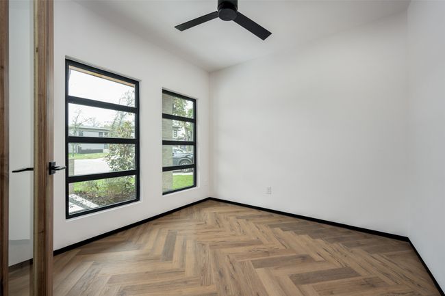 Unfurnished room featuring a ceiling fan and baseboards | Image 21