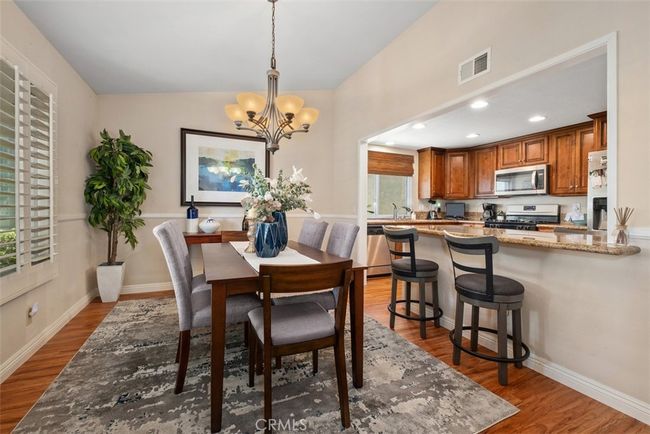 Here is a view of the large dining room area just off the kitchen | Image 20