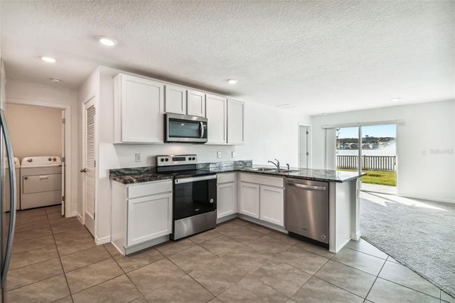 8027 Broad Pointe Dr, House other with 3 bedrooms, 2 bathrooms and null parking in Zephyrhills FL | Image 4