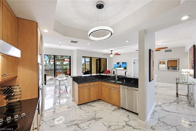 APT-108 - 5704 Cape Harbour Dr, Condo with 3 bedrooms, 2 bathrooms and 2 parking in CAPE CORAL FL | Image 9
