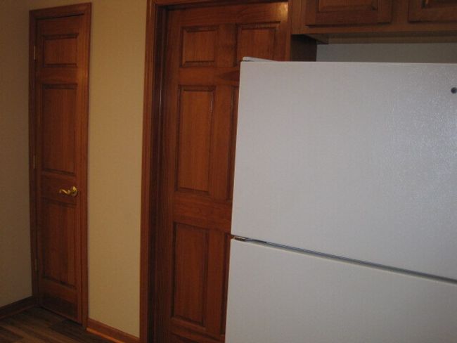 Pantry On the Left; Door to Laundry/Utility Room in the Middle of Picture | Image 5
