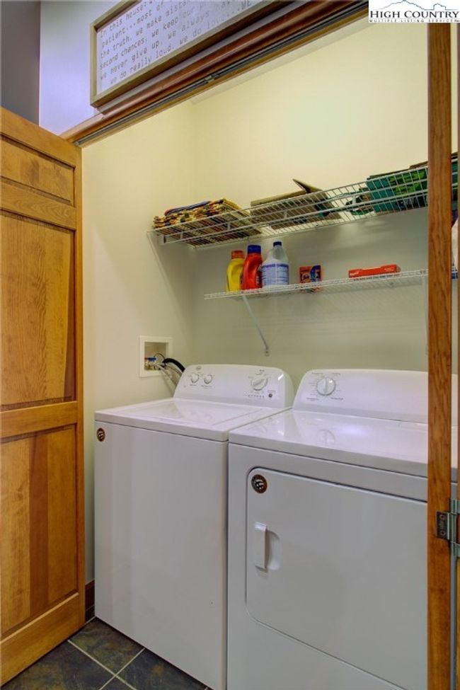 Full sized laundry is adjacent to the kitchen. | Image 26