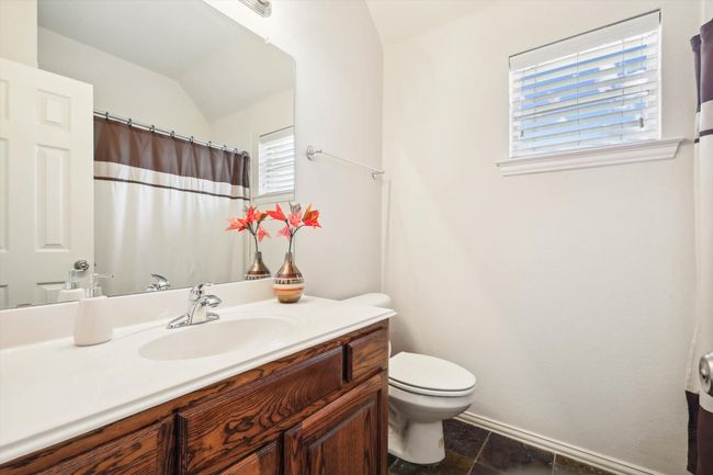Upstairs Bathroom off of game room by third upstairs bedroom | Image 29