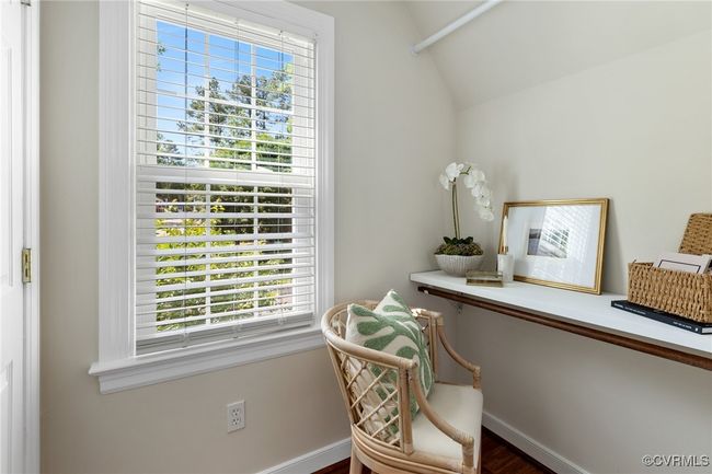 Office space with baseboards, dark wood-style flooring, and vaulted ceiling | Image 29