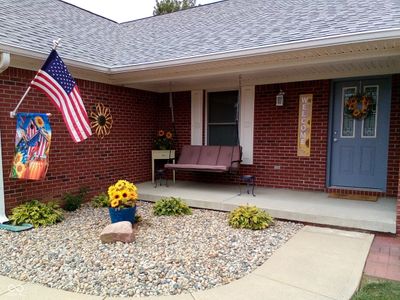 Enjoy sitting on the covered porch on front of house looking out on a fantastic corner lot. | Image 2