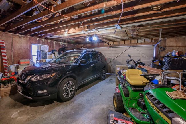 2-car garage and work space. | Image 19