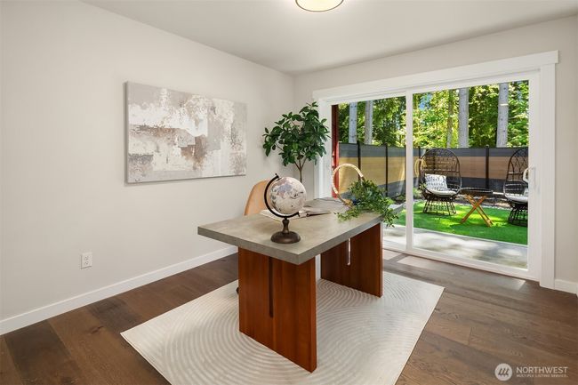 Convenient main-floor suite or private workspace. | Image 5