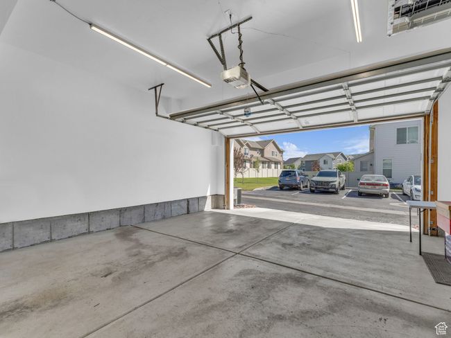 Fully finished Garage with a garage door opener and 2 - 8 foot LED lights, outdoor keypad transmitter too | Image 35
