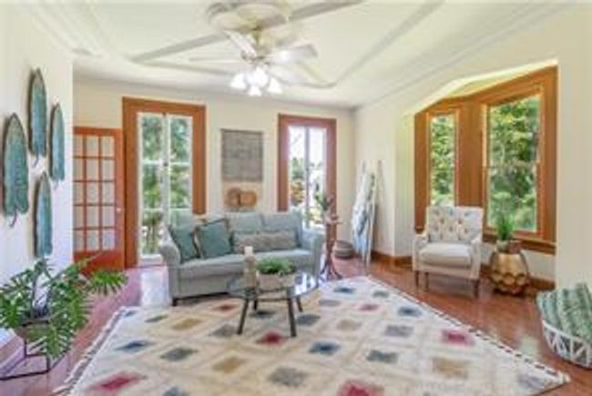 Gracious formal Lr with bow windows and floor to ceiling windows | Image 12