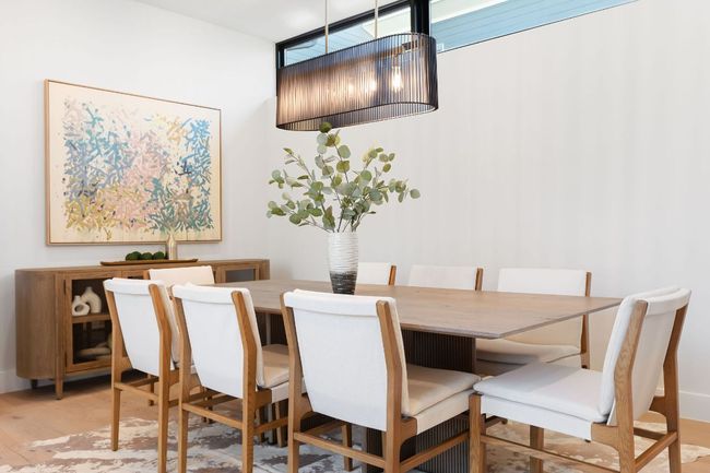 Dining space with wood finished floors | Image 16