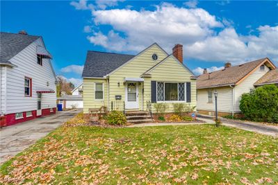 Bungalow-style house with a front yard | Image 2