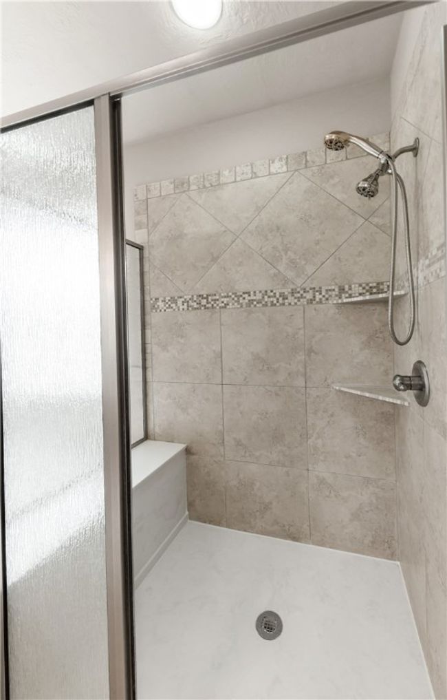 Bathroom with a stall shower | Image 24