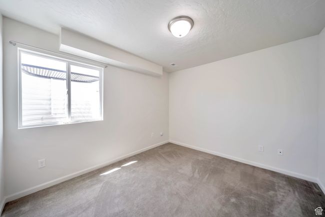 Unfurnished room with baseboards, carpet flooring, and a textured ceiling | Image 20