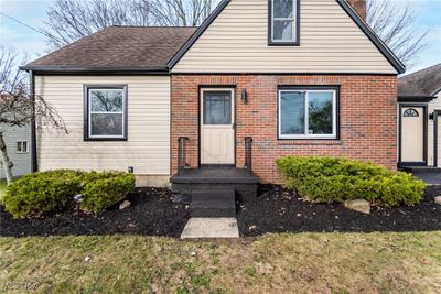 View of front facade with a front lawn | Image 3