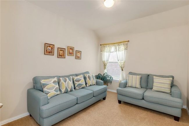 Carpeted living room with baseboards | Image 18