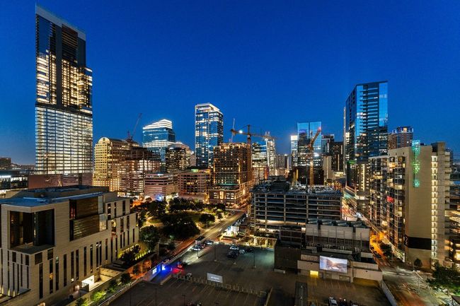 City view featuring a view of city lights from balcony | Image 27