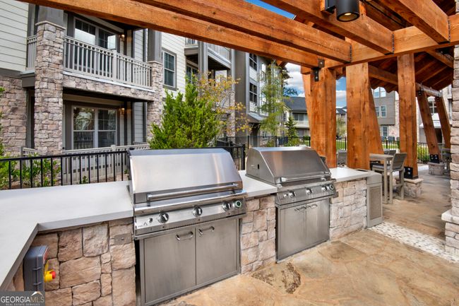 APT-1212 - 1520 Laurel Crossing Pkwy, Condo with 3 bedrooms, 2 bathrooms and 2 parking in Buford GA | Image 26