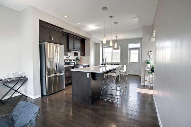 558 Panatella Walk Nw, Home with 2 bedrooms, 2 bathrooms and 3 parking in Calgary AB | Image 3