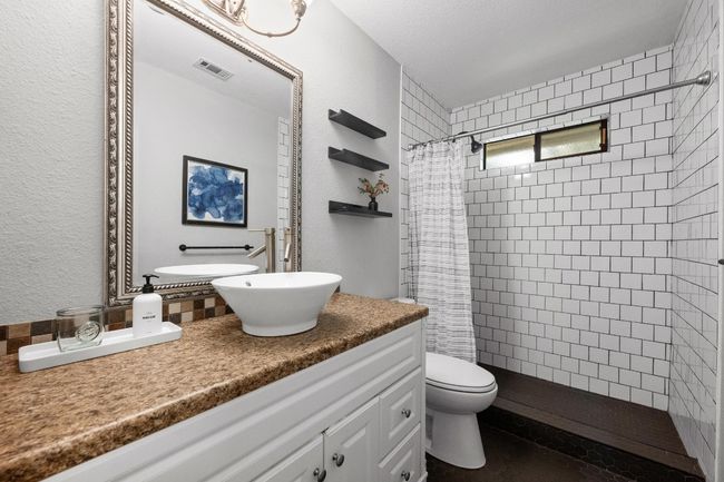 Bathroom 2 with vanity and a tile shower | Image 22